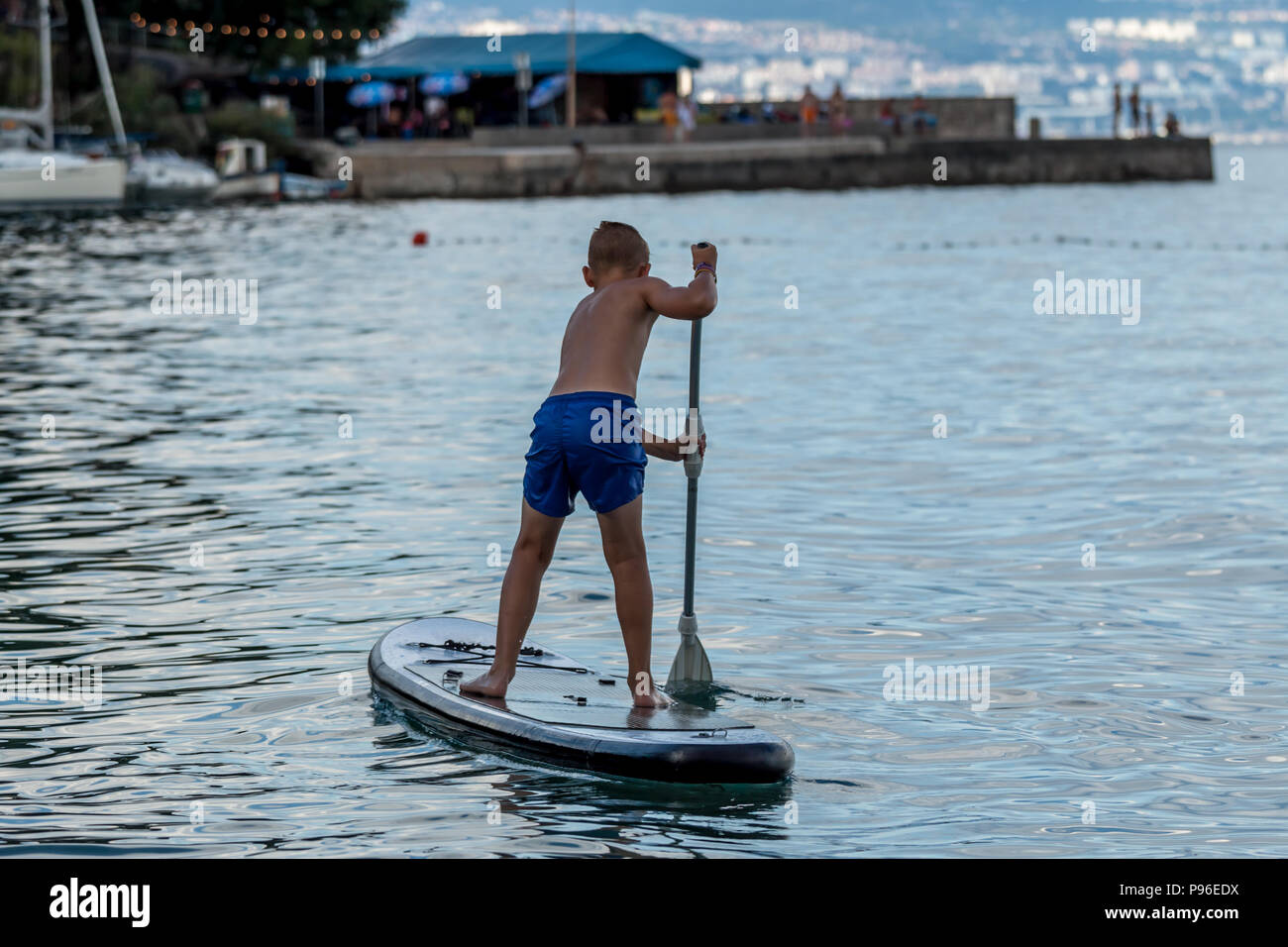 stand up paddle boarding on the sea Stock Photo