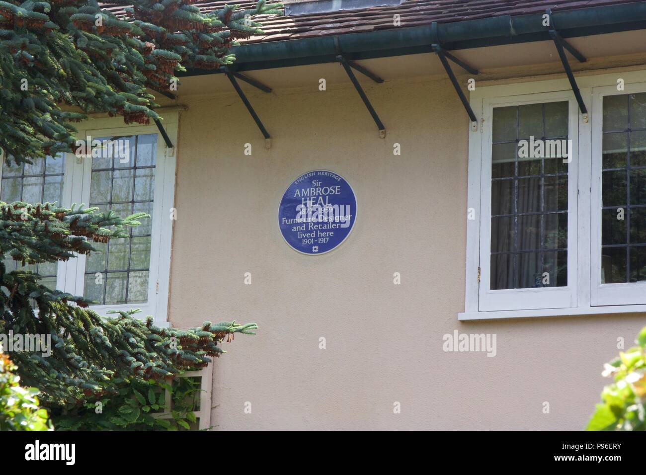 Blue plaque in Pinner, Harrow for Sir Ambrose Heal (872-1959) who was a furniture designer and busnessman Stock Photo