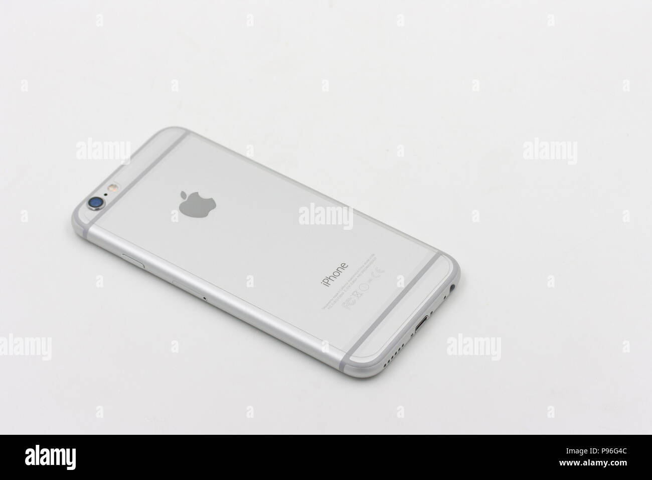 BANGKOK, THAILAND - MAY 7, 2015. Back of Apple Iphone 6 in white color laying on white background. Stock Photo