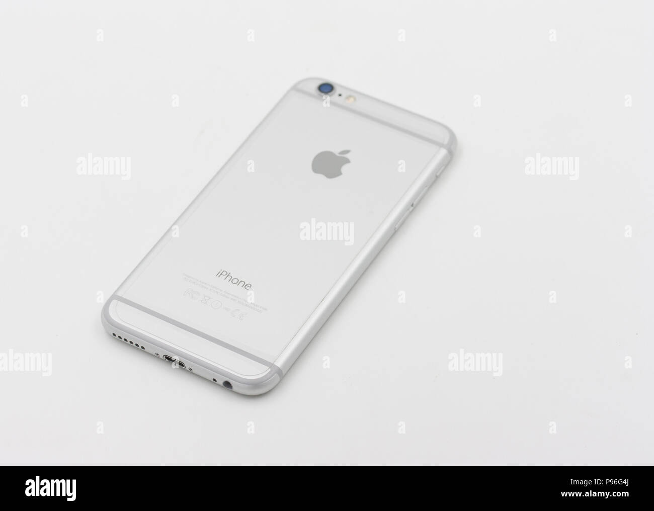 BANGKOK, THAILAND - MAY 7, 2015. Back of Apple Iphone 6 in white color laying on white background. Stock Photo