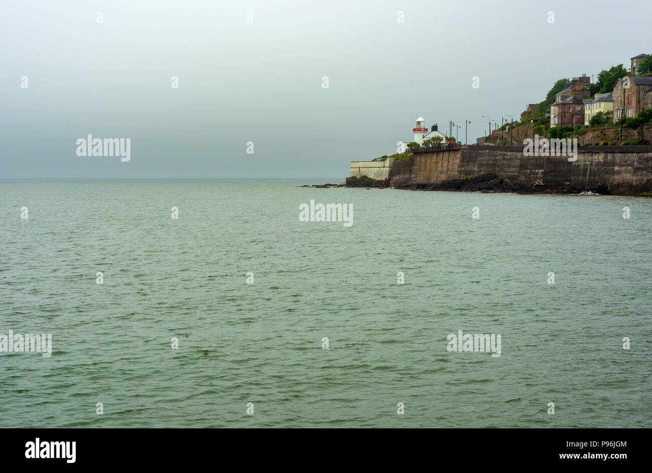 Lighthouses in Ireland and the Youghal Lighthouse as seen from Green Park on dull day in Youghal, County Cork, Ireland. Stock Photo