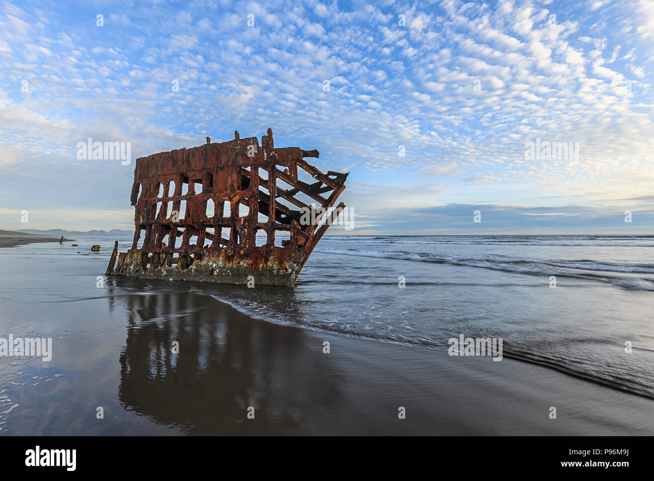 The Peter Iredale shipwreck near Astoria Oregon taken near sunset. Stock Photo