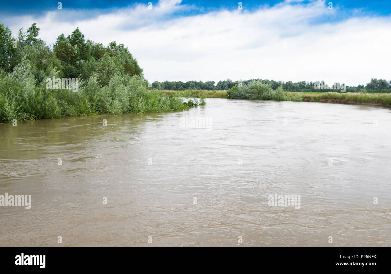 floods river overflows its banks Stock Photo