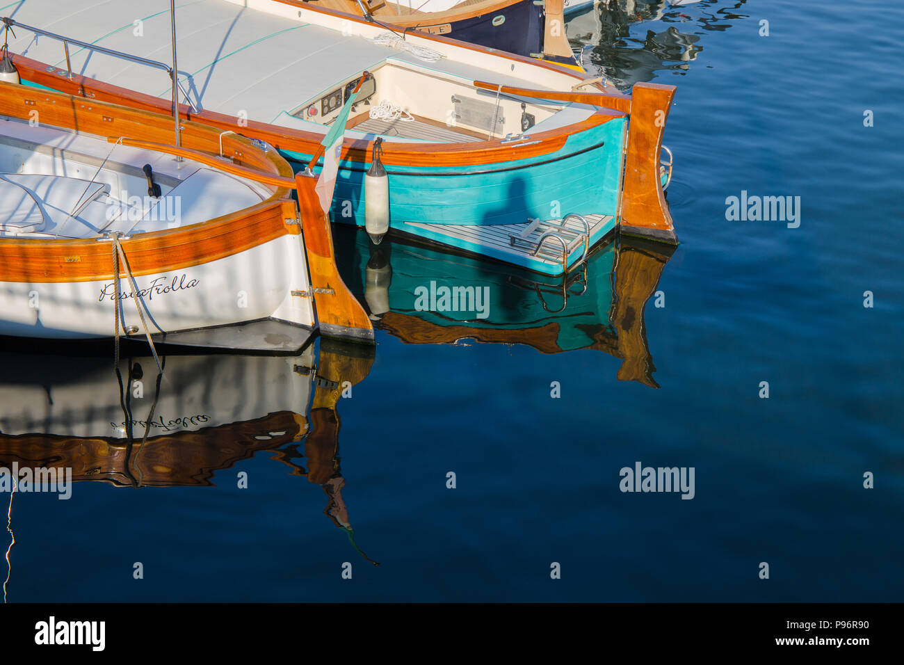 genoa-genova-italy-july-9-2018-two-boats-reflecting-in-the-sea