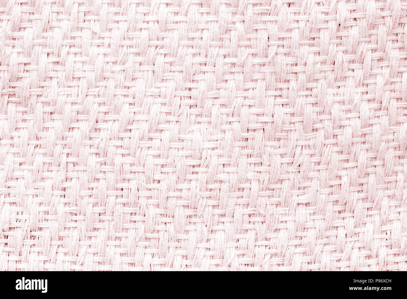 Red hand weaving matting tweed fabric texture. Closeup horizontal fragment Stock Photo