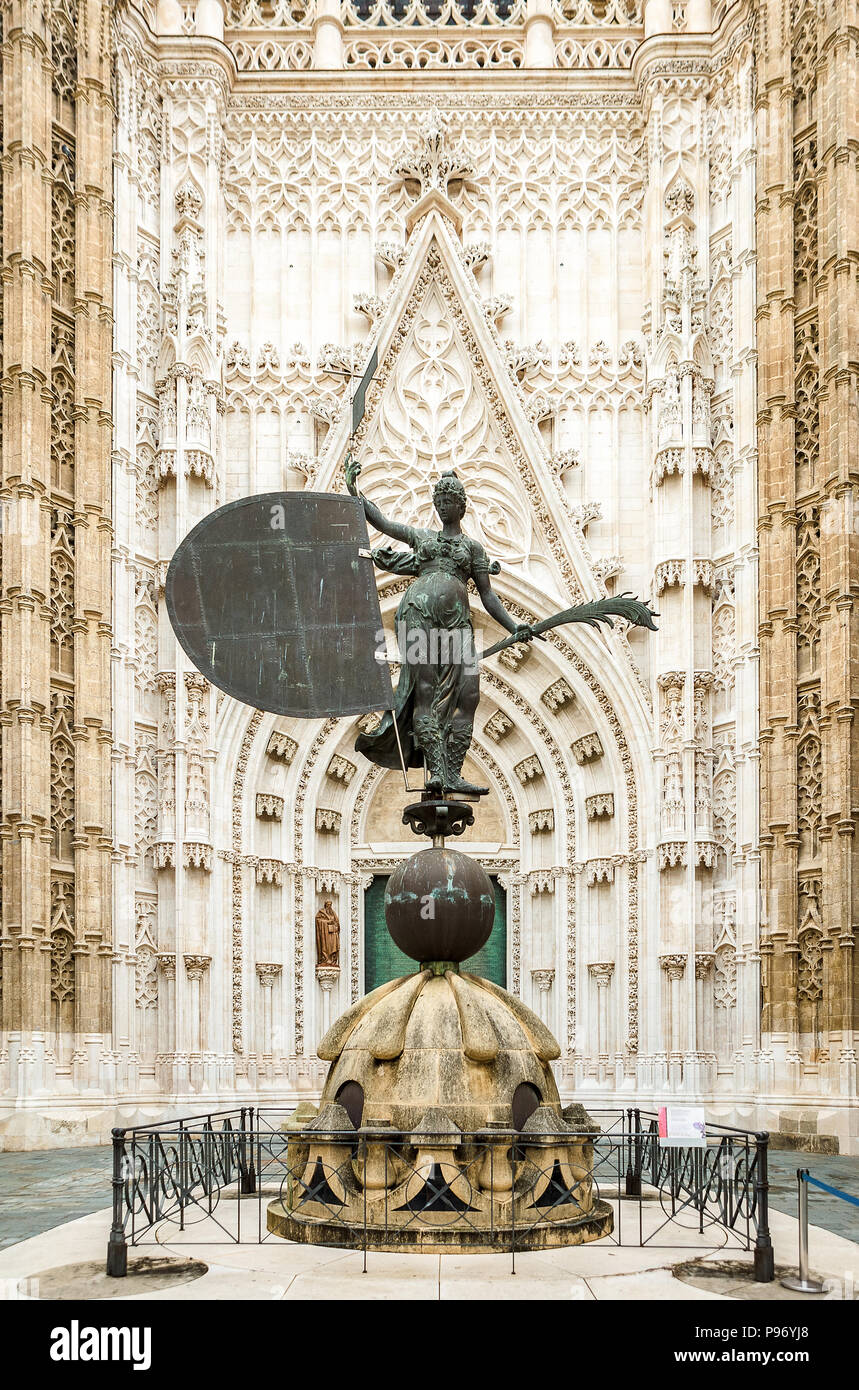 Door of the Prince. The statue at the entrance to the Cathedral in Seville, Andalusia, Spain. Catedral de Santa Maria de la Sede Stock Photo