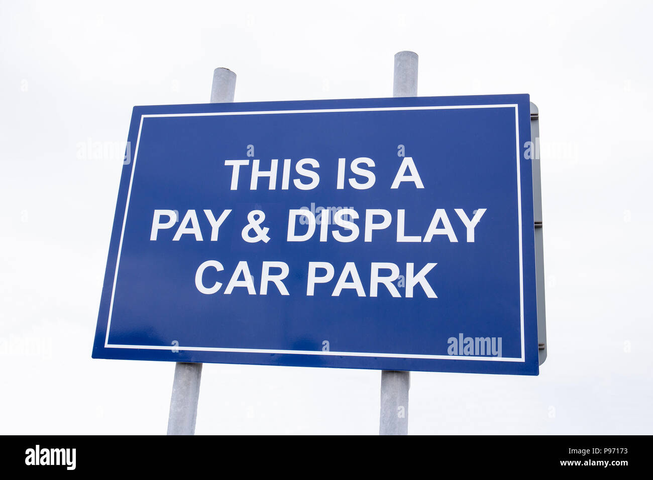 Pay & Display parking sign on a shopping centre car park UK Stock Photo