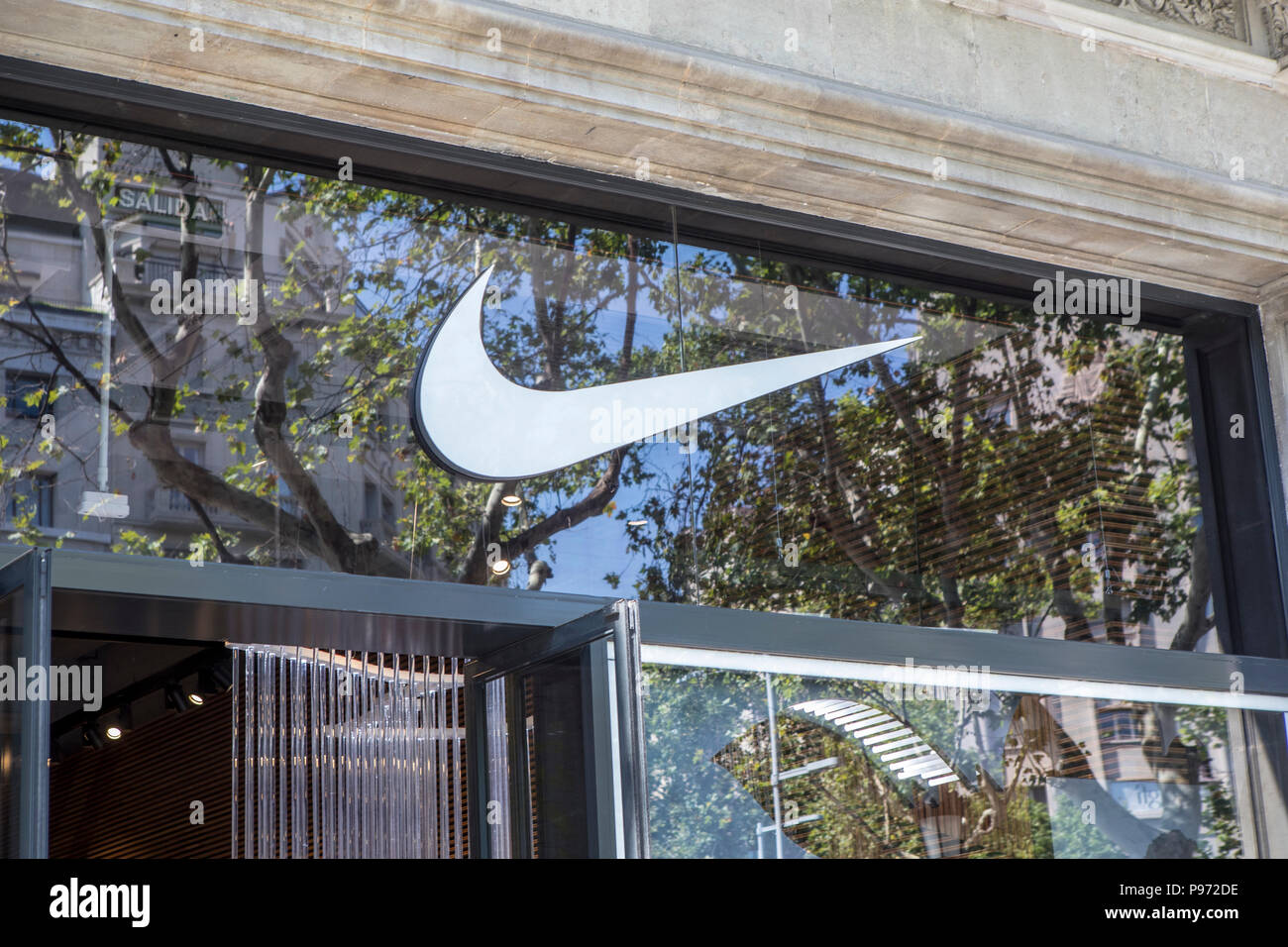 Nike sign on Passeig de Gràcia street in Barcelona. Barcelona is a city in  Spain. It is the capital and largest city of Catalonia, as well as the  second most populous municipality