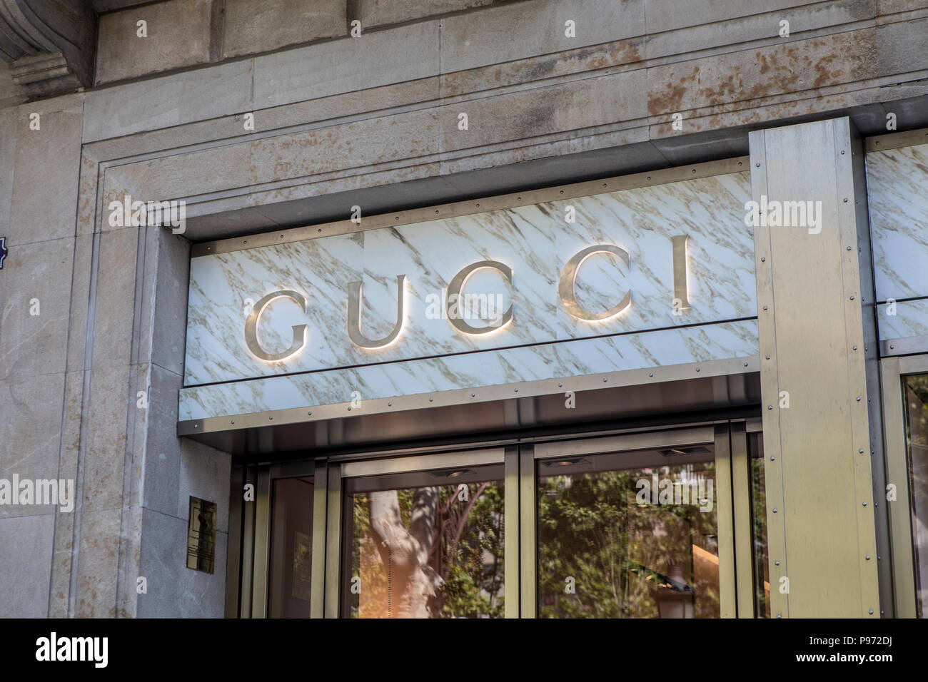 GUCCI sign on Passeig de Gràcia street in Barcelona. Barcelona is a city in Spain. It is the capital and largest city of Catalonia, as well as the most populous municipality