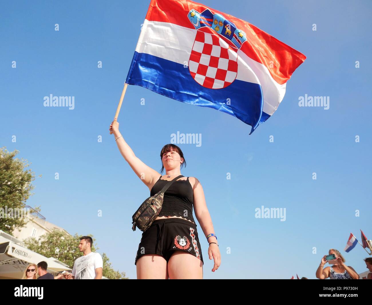 A Woman Is Seen Holding A Croatian Flag Croatians In The