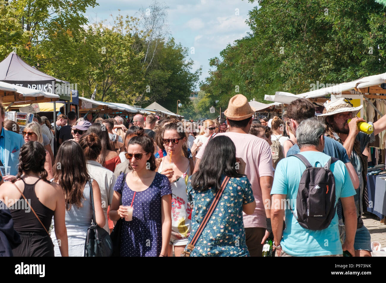 Berlin, Germany july 2018 People on crowded flea market ( Mauerpark Flohmarkt) on a sunny