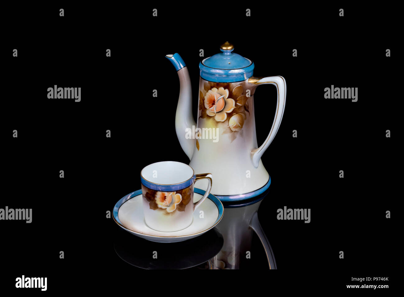 Vintage Noritake bone china coffee service circa 1904 on a black 