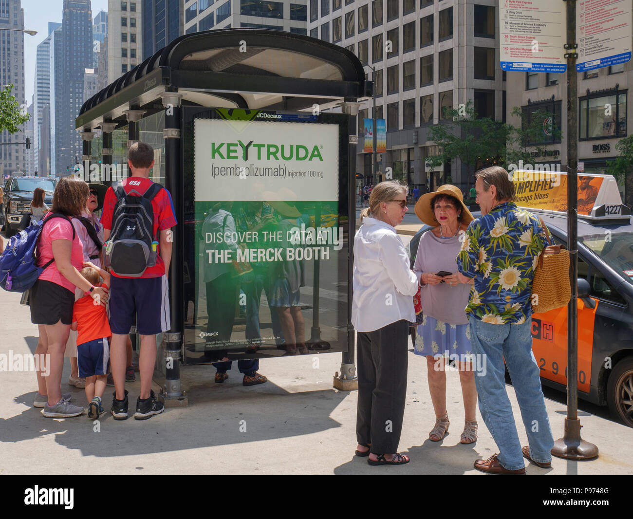 Bus shelter with advertisement for Keytruda, a monoclonal antibody anti-cancer drug. Stock Photo