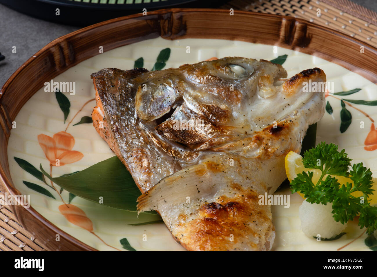 grilled salmon head kabutoyaki Stock Photo - Alamy