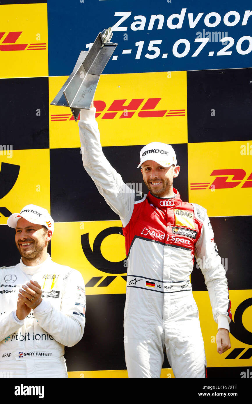 Zandvoort, Netherlands. 15th July, 2018. Rene Rast from Germany of the Audi  Sport Team Rosberg celebrating on the podium after his victory at the DTM  races in the Circuit Zandvoort. Defending champion