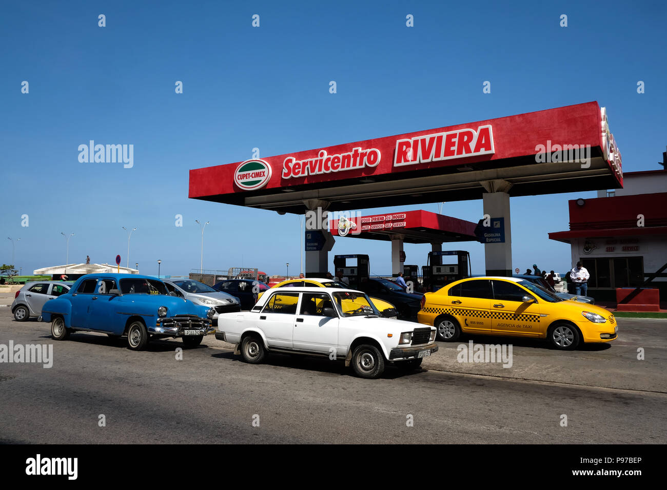 Havana, Cuba. 21st June, 2019. Cars parked and filling up gas at a gas