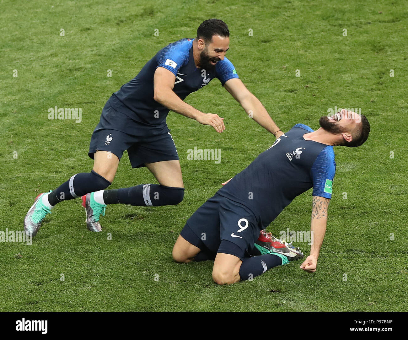 Moscow, Russia. 15th July, 2018. France's Olivier Giroud (R) and Adil Rami celebrate victory after the 2018 FIFA World Cup final match between France and Croatia in Moscow, Russia, July 15, 2018. France defeated Croatia 4-2 and claimed the title. Credit: Xu Zijian/Xinhua/Alamy Live News Stock Photo