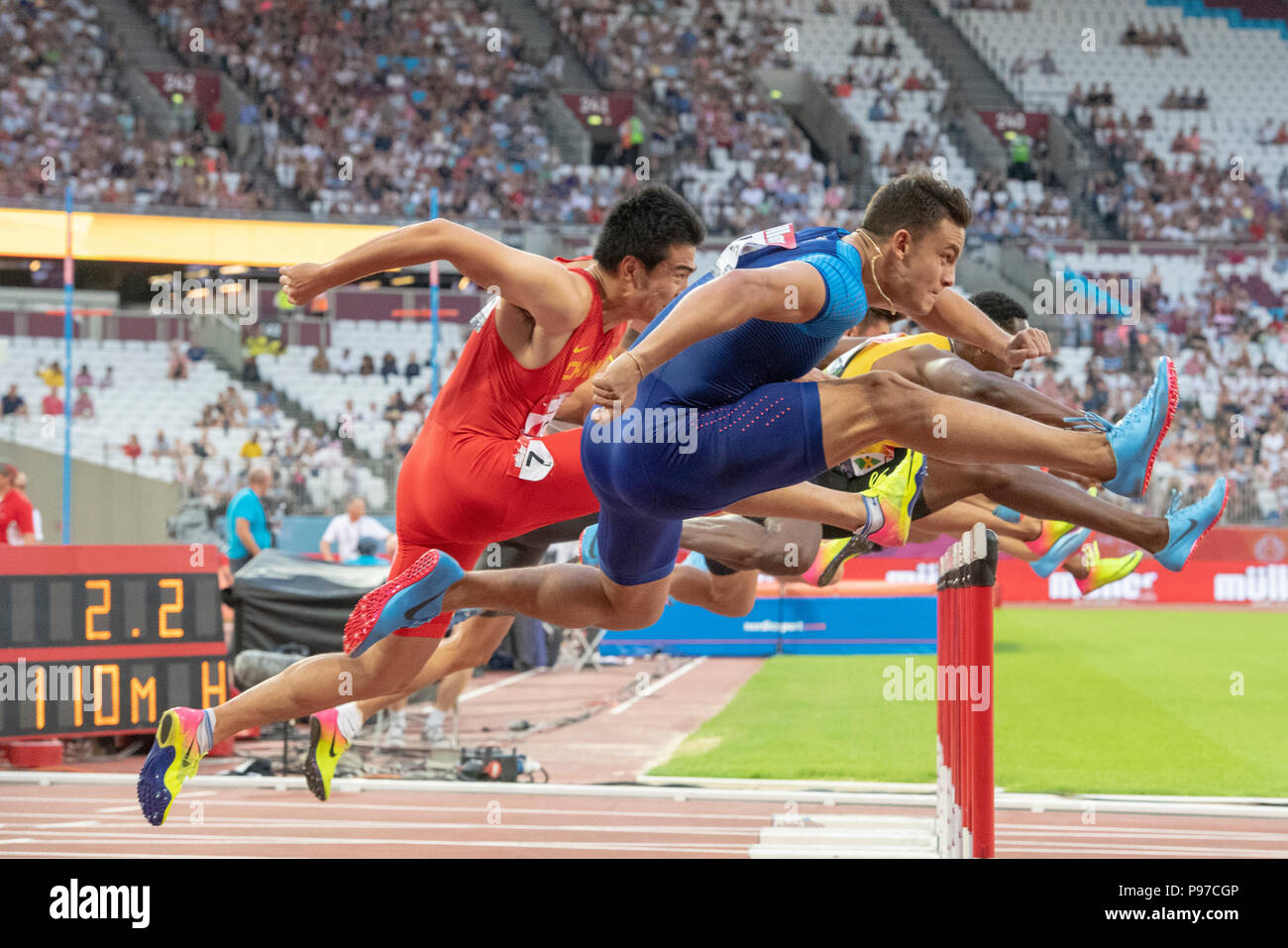 London, UK. 14th July 2018. Devon Allen (USA) clears a barrier during the 110m Hurdles at the Athletics World Cup  at the London Stadium, London, Great Britiain, on 14 July 2018. Credit: Andrew Peat/Alamy Live News Stock Photo