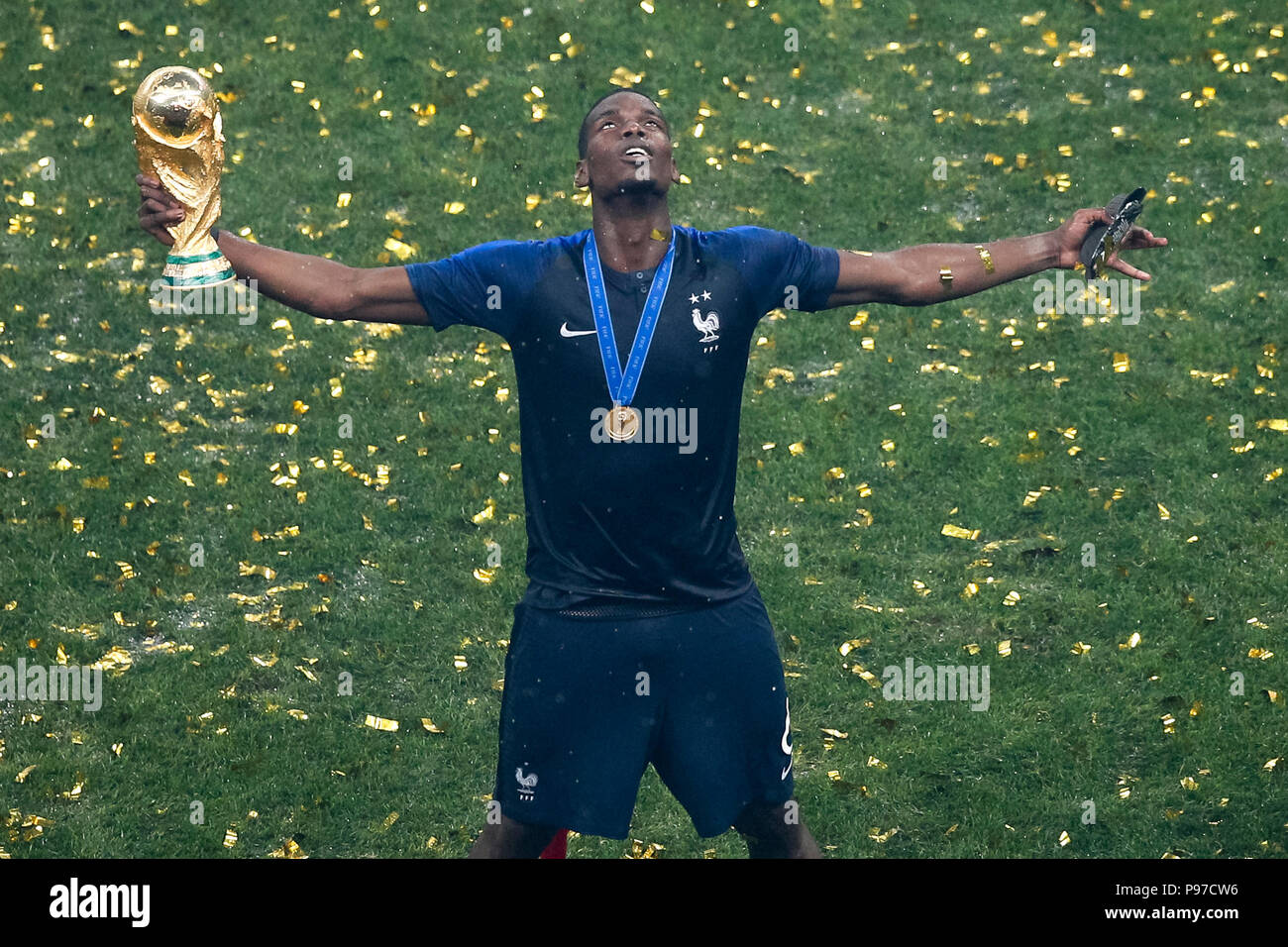 Moscow, Russia. 15th July 2018. Paul Pogba of France celebrates with the trophy after the 2018 FIFA World Cup Final match between France and Croatia at Luzhniki Stadium on July 15th 2018 in Moscow, Russia. (Photo by Daniel Chesterton/phcimages.com) Credit: PHC Images/Alamy Live News Stock Photo