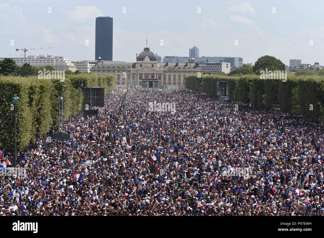 Paris, France. 15th July 2018. Supporters of the French football team  gather at the Champ-de-Mars fan zone to watch the final match of the soccer  World Cup between France and Croatia. Des