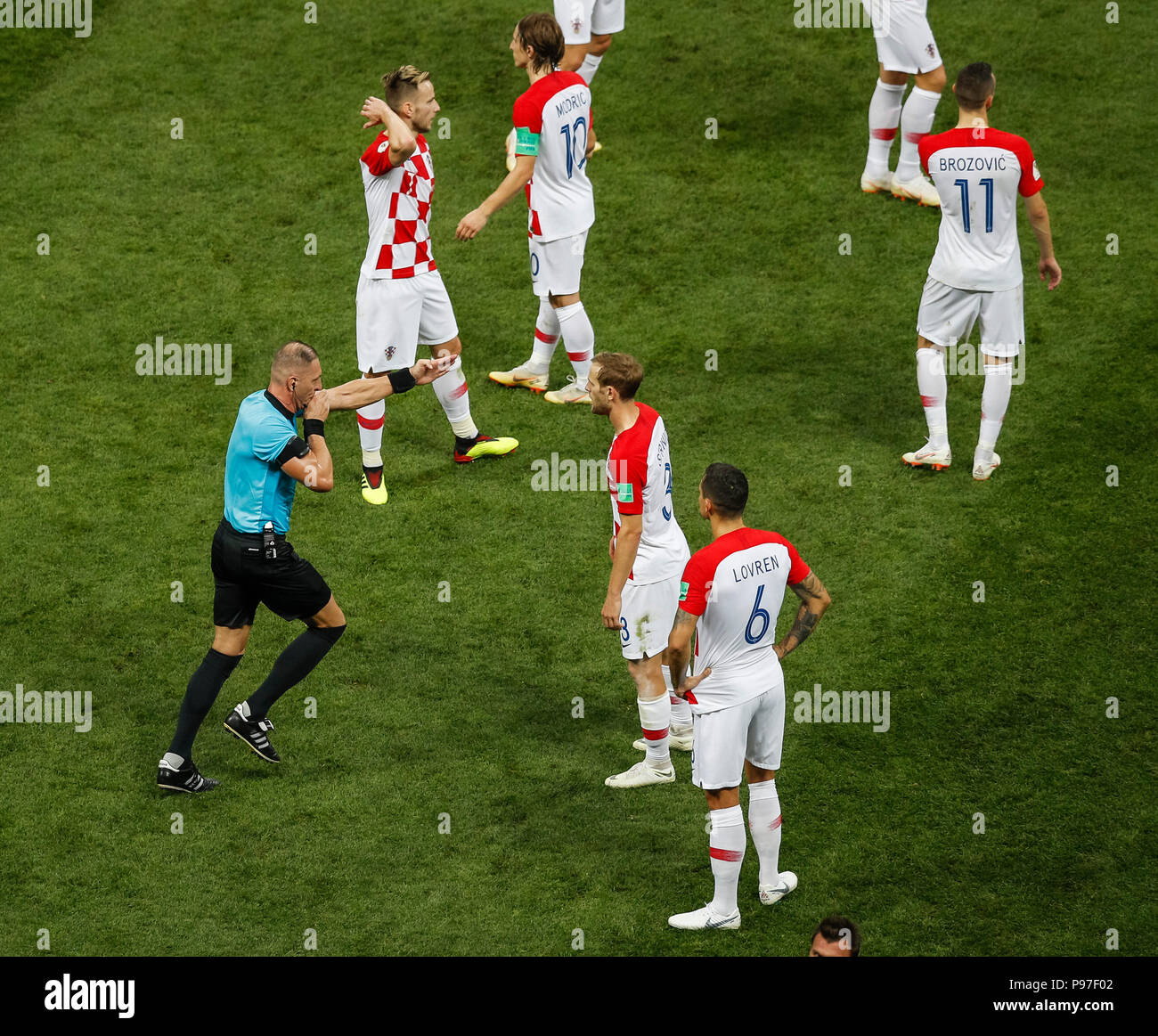 Moscow, Russia. 15th July 2018. Referee Nestor Pitana gestures for a penalty after consulting VAR during the 2018 FIFA World Cup Final match between France and Croatia at Luzhniki Stadium on July 15th 2018 in Moscow, Russia. (Photo by Daniel Chesterton/phcimages.com) Credit: PHC Images/Alamy Live News Stock Photo