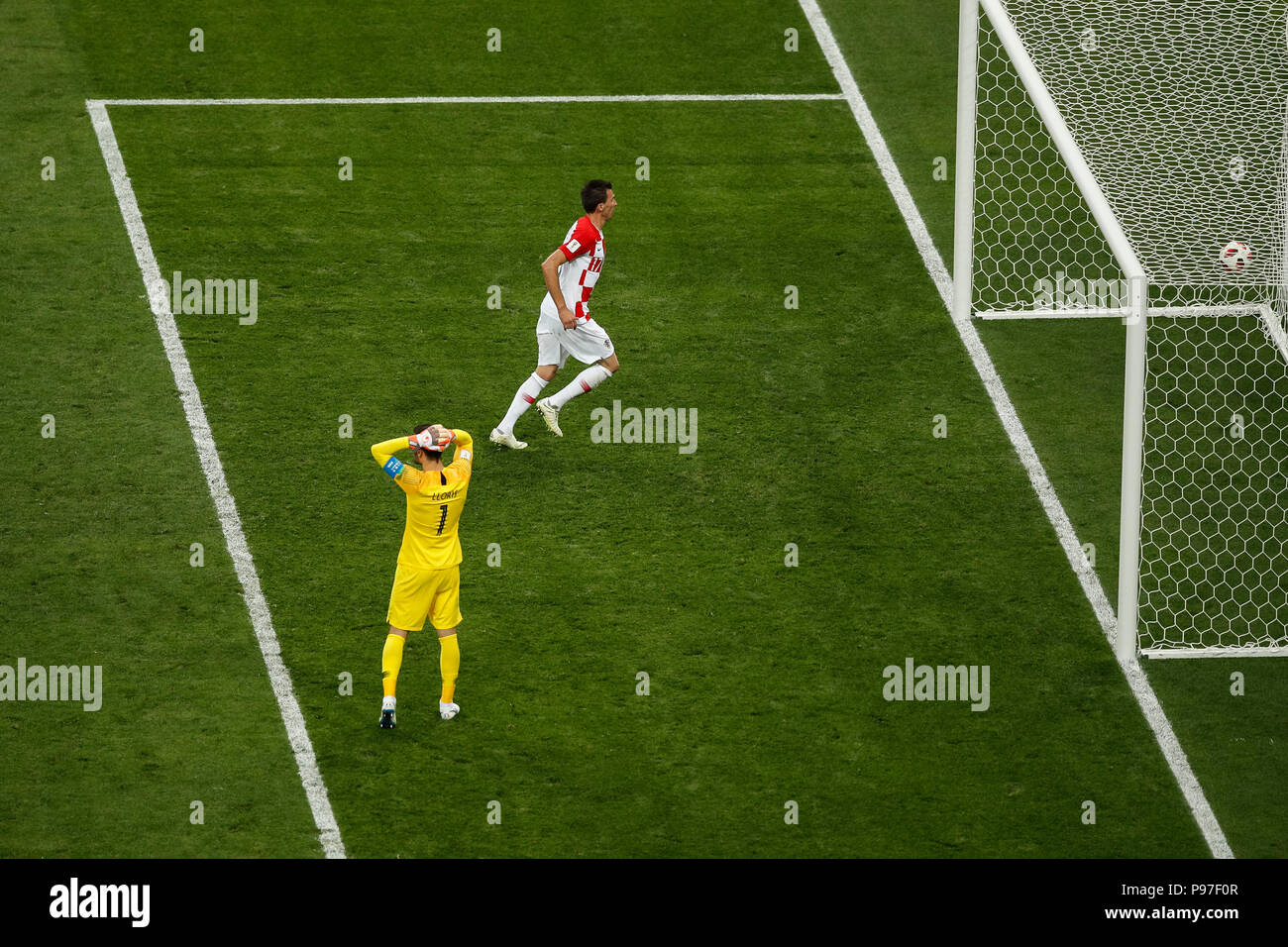 Moscow, Russia. 15th July 2018. Mario Mandzukic of Croatia scores his side's second goal to make the score 4-2 after a mistake by Hugo Lloris of France during the 2018 FIFA World Cup Final match between France and Croatia at Luzhniki Stadium on July 15th 2018 in Moscow, Russia. (Photo by Daniel Chesterton/phcimages.com) Credit: PHC Images/Alamy Live News Stock Photo