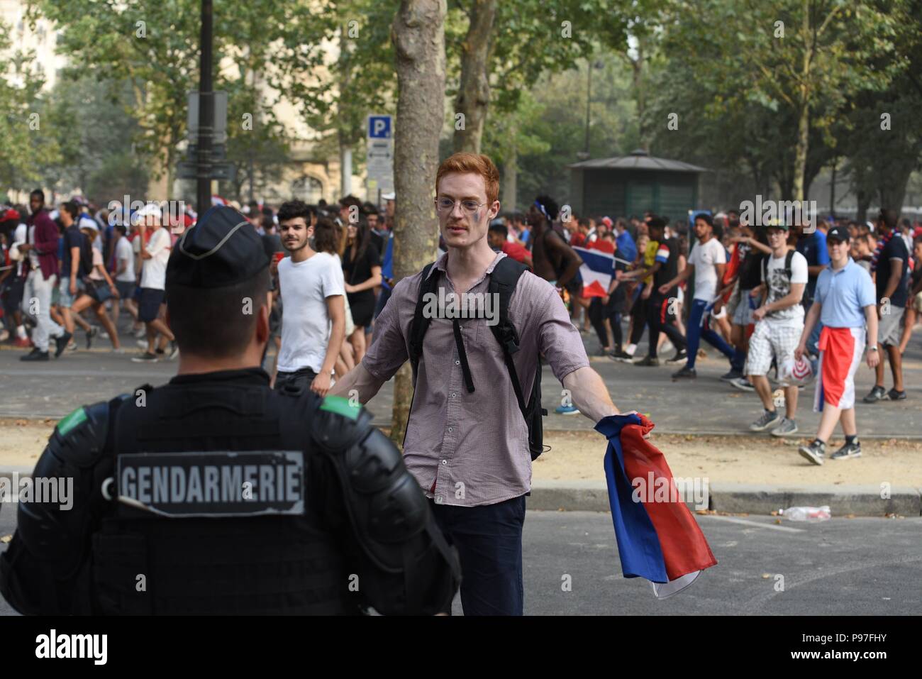 Paris France 15th July 2018 Supporters Of The French Football Team Greet French Security Forces After France Win Its World Cup Final Against Croatia 4 2 Des Supporters De L Equipe De France De