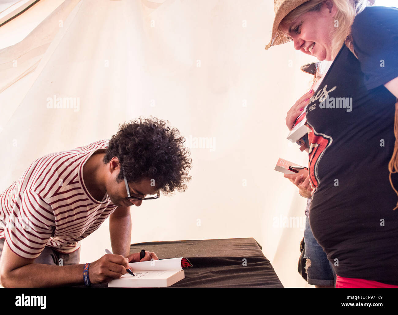 Richard Ayoade signing books at Latitude Festival, Henham Park, Suffolk, England, 15th July, 2018 Stock Photo