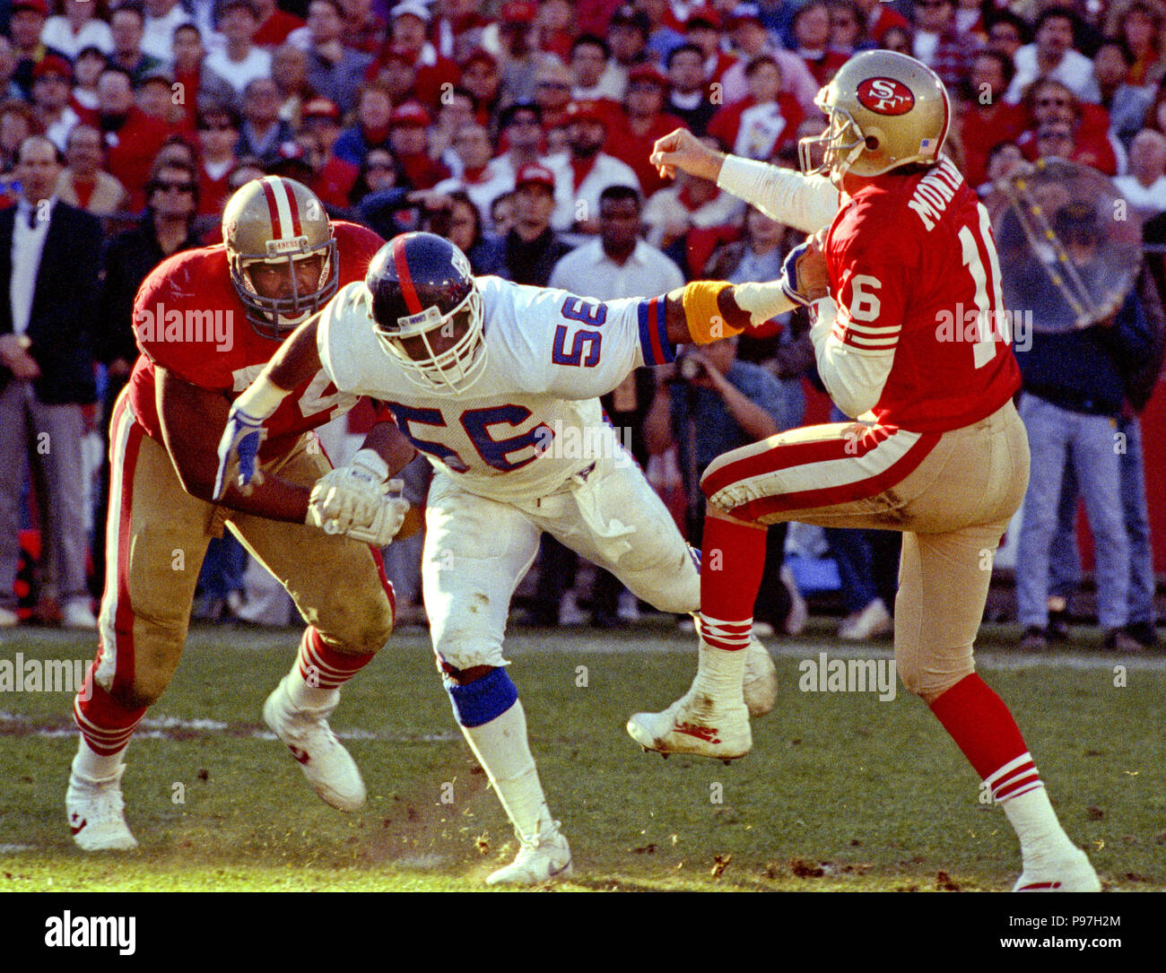 San Francisco, California, USA. 20th Jan, 1991. San Francisco 49ers vs New  York Giants at Candlestick Park Saturday, January 20, 1991. Giants beat  49ers 15-13. Giants linebacker Lawrence Taylor (56) rushes 49er