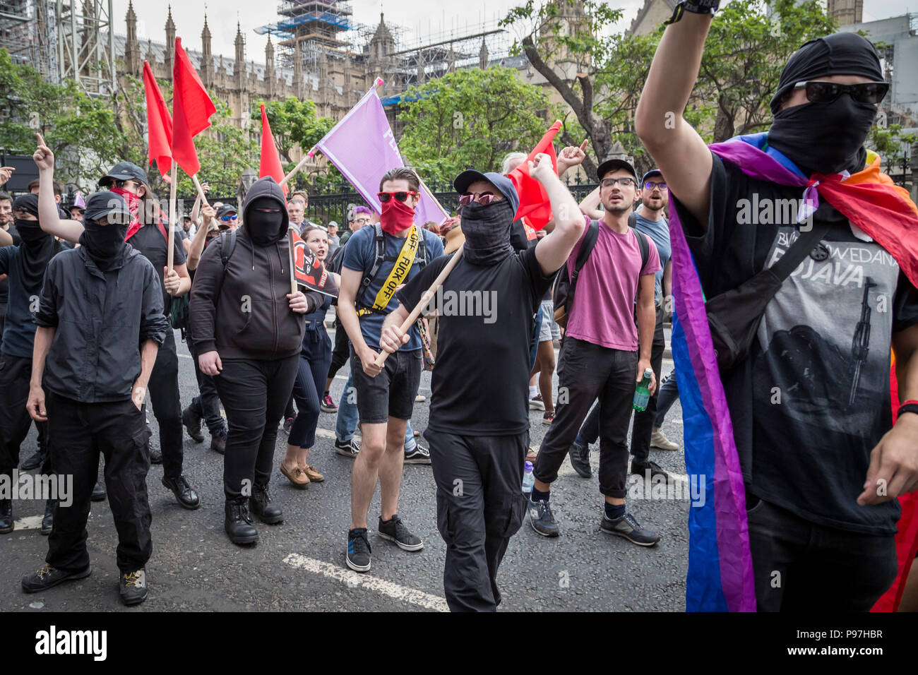 London, UK. 14th July 2018. Anti-fascist protesters clash with right-wing pro-Trump, ‘Free Tommy Robinson’ supporters and police in Westminster as Donald Trump visits London. Credit: Guy Corbishley/Alamy Live News Stock Photo