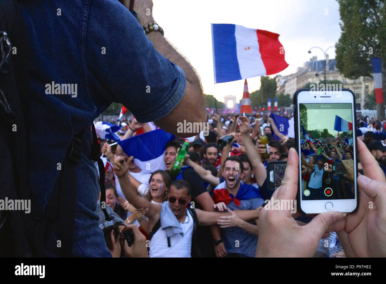 Paris, France. 15 July 2018. Football fans celebrate World Cup victory. Roland Phillips/Alamy Live News Stock Photo