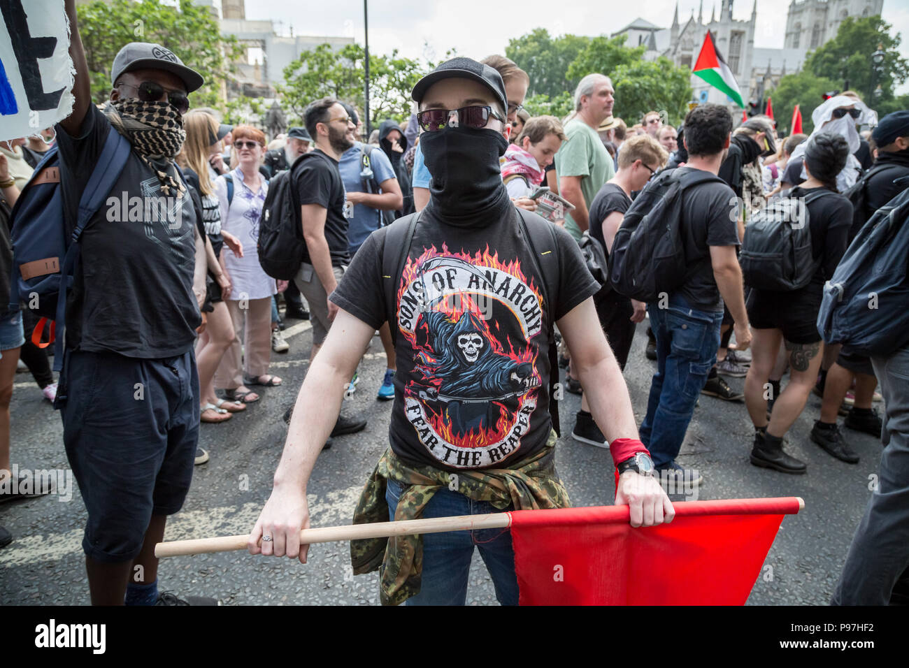 London, UK. 14th July 2018. Anti-fascist protesters clash with right-wing pro-Trump, ‘Free Tommy Robinson’ supporters and police in Westminster as Donald Trump visits London. Credit: Guy Corbishley/Alamy Live News Stock Photo