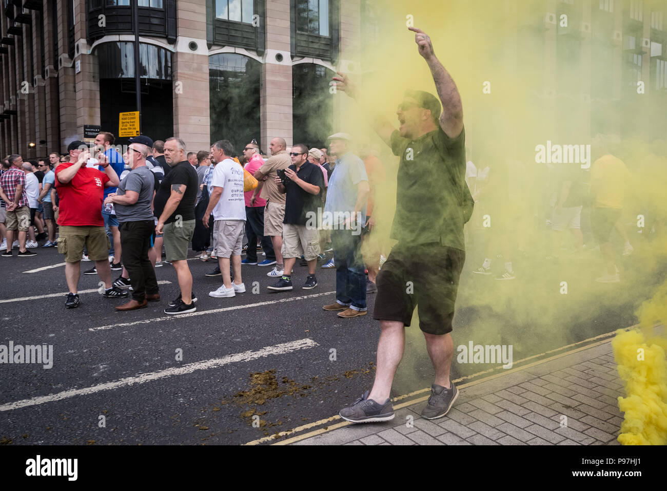 London, UK. 14th July 2018. Right-wing pro-Trump and ‘Free Tommy Robinson’ supporters protest and clash with police in Westminster as Donald Trump, the 45th President of the United States, is due to visit London as part of his official UK visit. Credit: Guy Corbishley/Alamy Live News Stock Photo