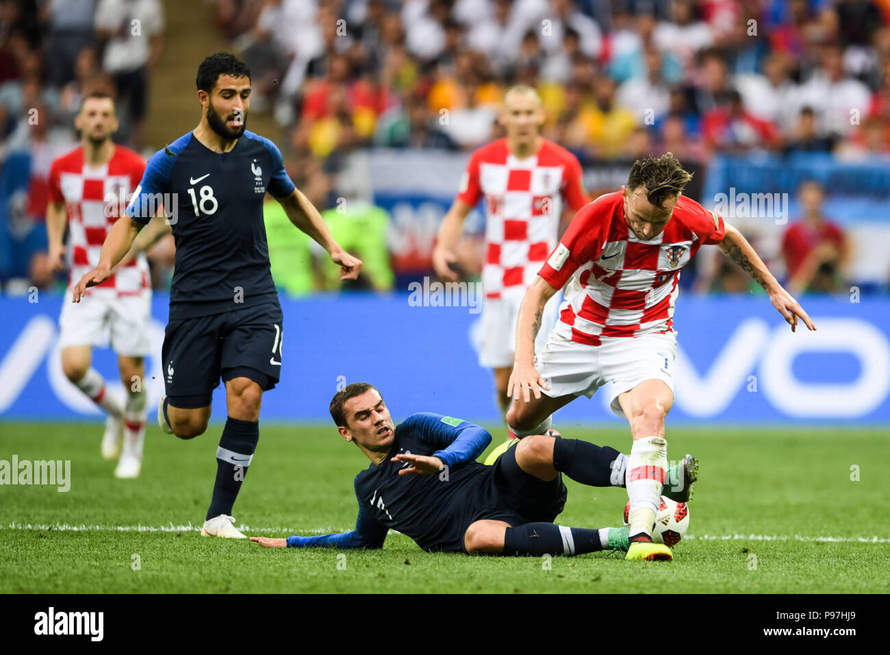 Moscow, Russia. 15th July 2018. Antoine Griezmann of France tackling Ivan Rakitic of Croatia at Luzhniki Stadium during the final between Franceand Croatia during the 2018 World Cup. Ulrik Pedersen/CSM Credit: Cal Sport Media/Alamy Live News Stock Photo