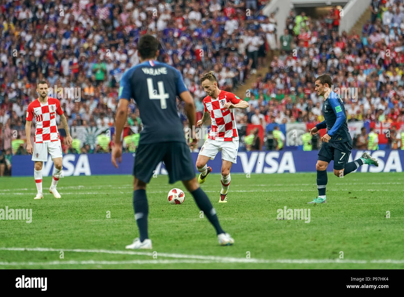 Moscow, Russia. 15th July 2018. Ivan Rakitic of Croatia going past Antoine Griezmann of France at Luzhniki Stadium during the final between Franceand Croatia during the 2018 World Cup. Ulrik Pedersen/CSM Credit: Cal Sport Media/Alamy Live News Stock Photo