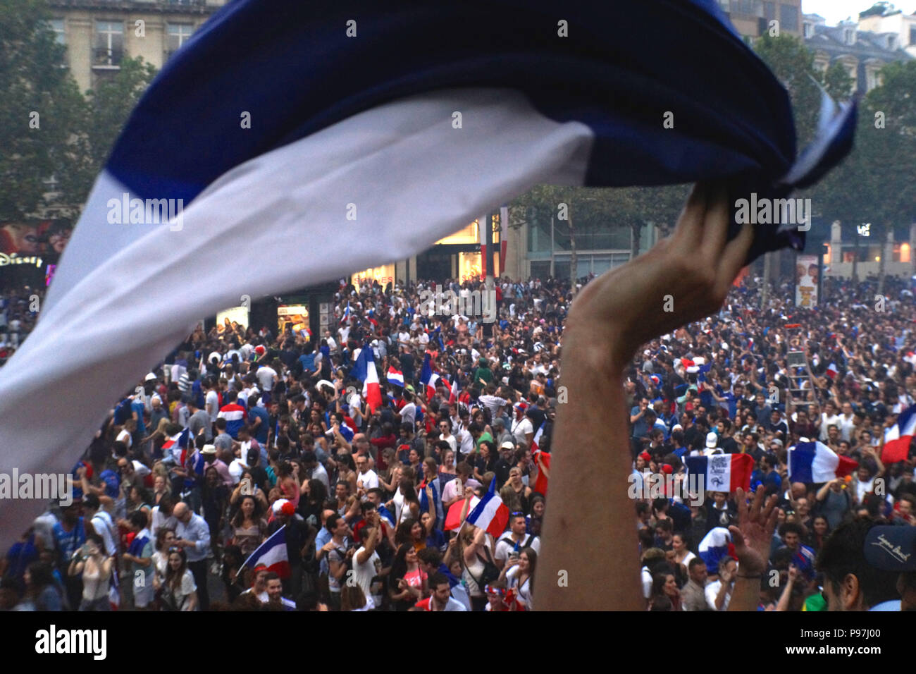 Paris, France. 15 July 2018. Football fans celebrate World Cup victory. Roland Phillips/Alamy Live News Stock Photo