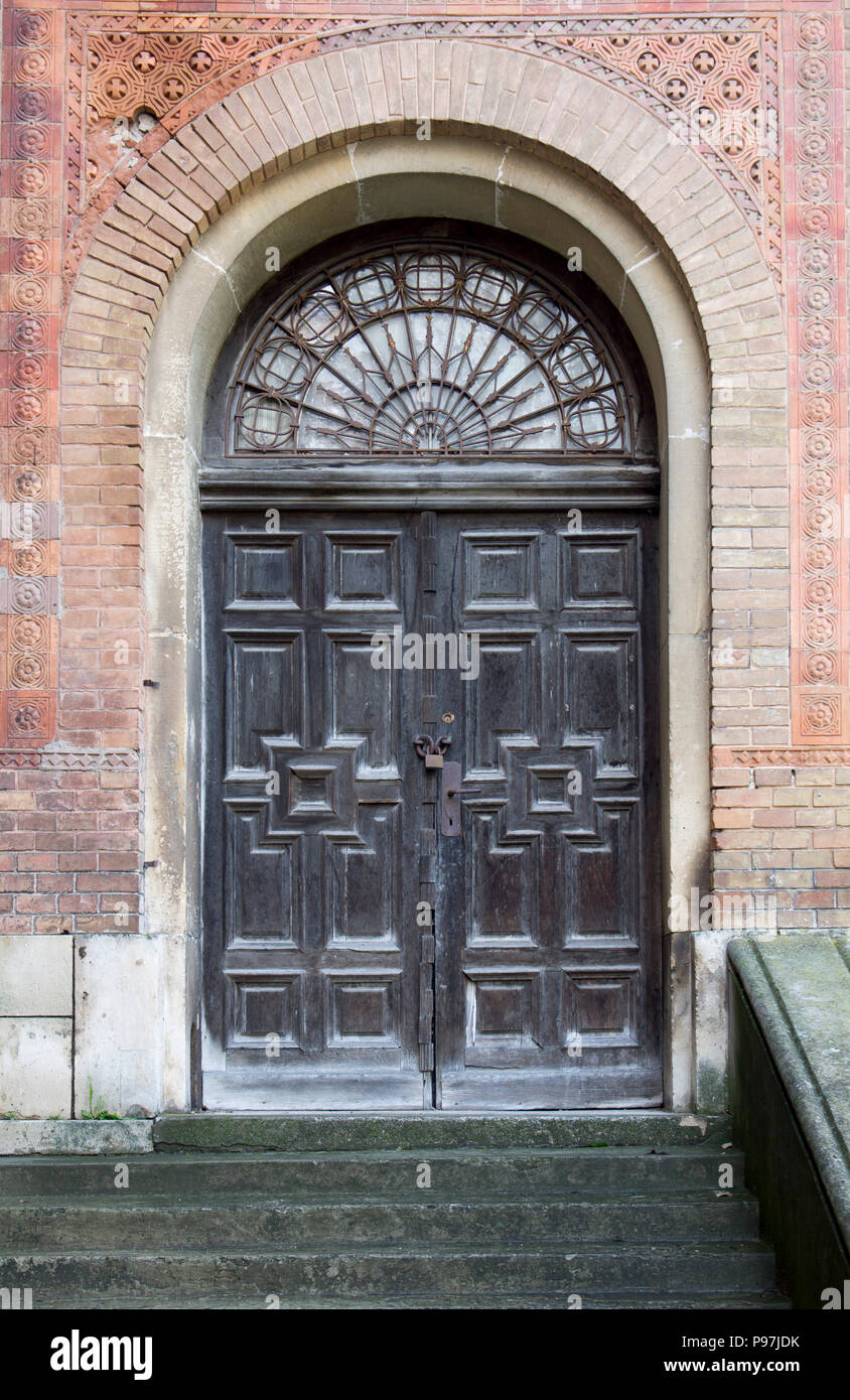 Photo of antique vintage old style wooden door. Stock Photo