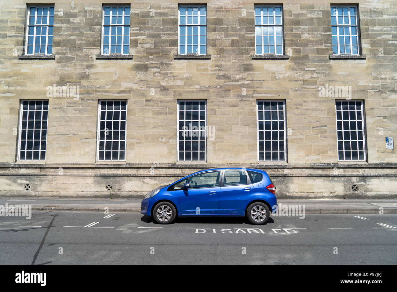 Car in street parking hi-res stock photography and images - Alamy