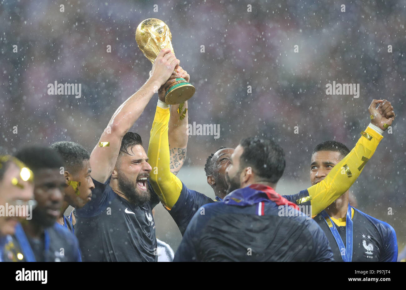 France's Olivier Giroud celebrates with the trophy after winning the FIFA World Cup Final at the Luzhniki Stadium, Moscow. Stock Photo
