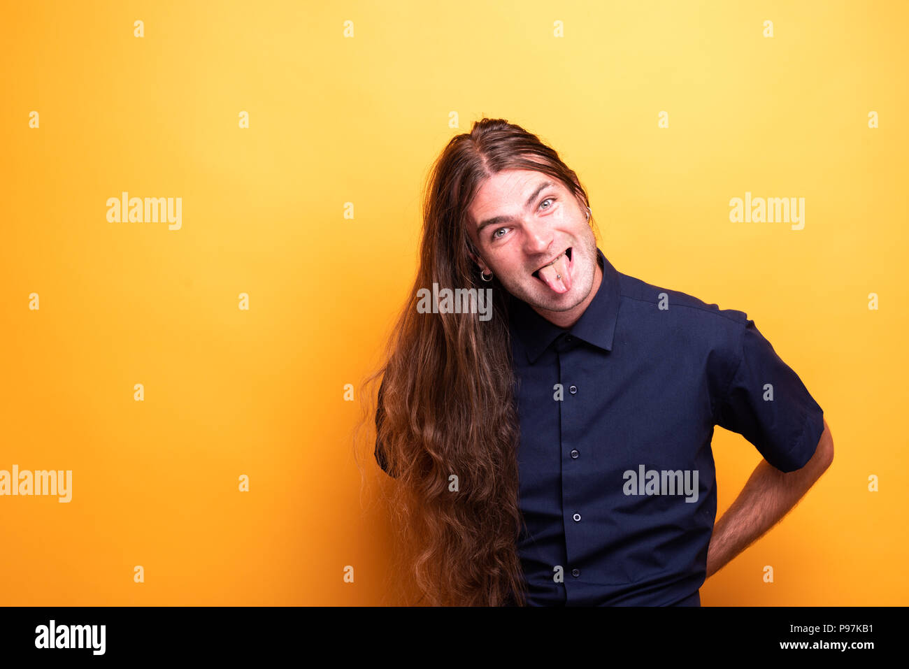 Funny man sticking his tongue out Stock Photo
