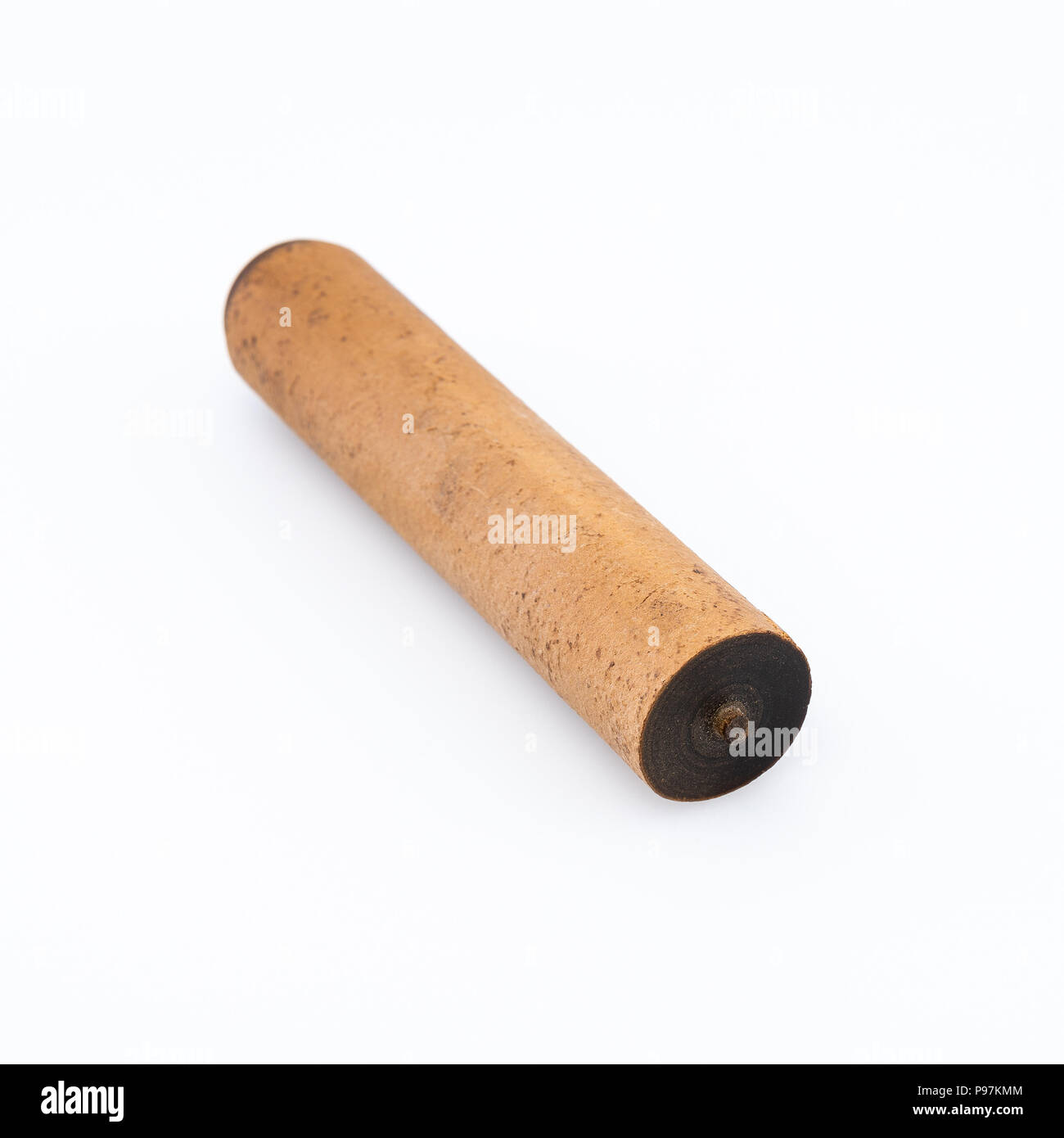 Ebonite Stick On White Background With Shadows Cross Cut Also Is