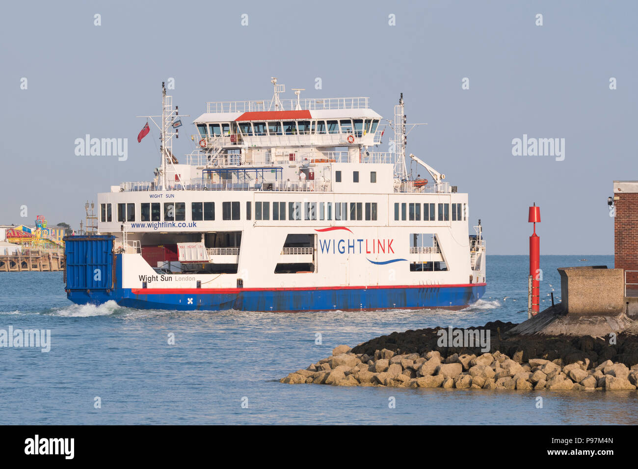 Wight Sun, a Wightlink passenger ferry, exiting Portsmouth Harbour into The Solent Strait (Solent Sea). Wightlink ship in Portsmouth, Hampshire, UK. Stock Photo