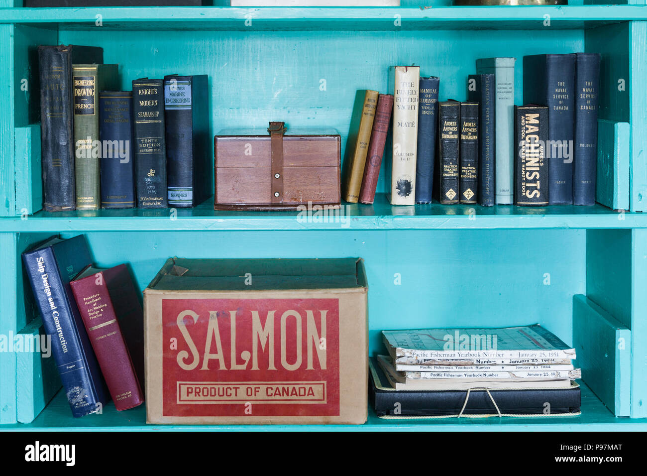 Selection of older technical books on a shelf at the heritage Britannia