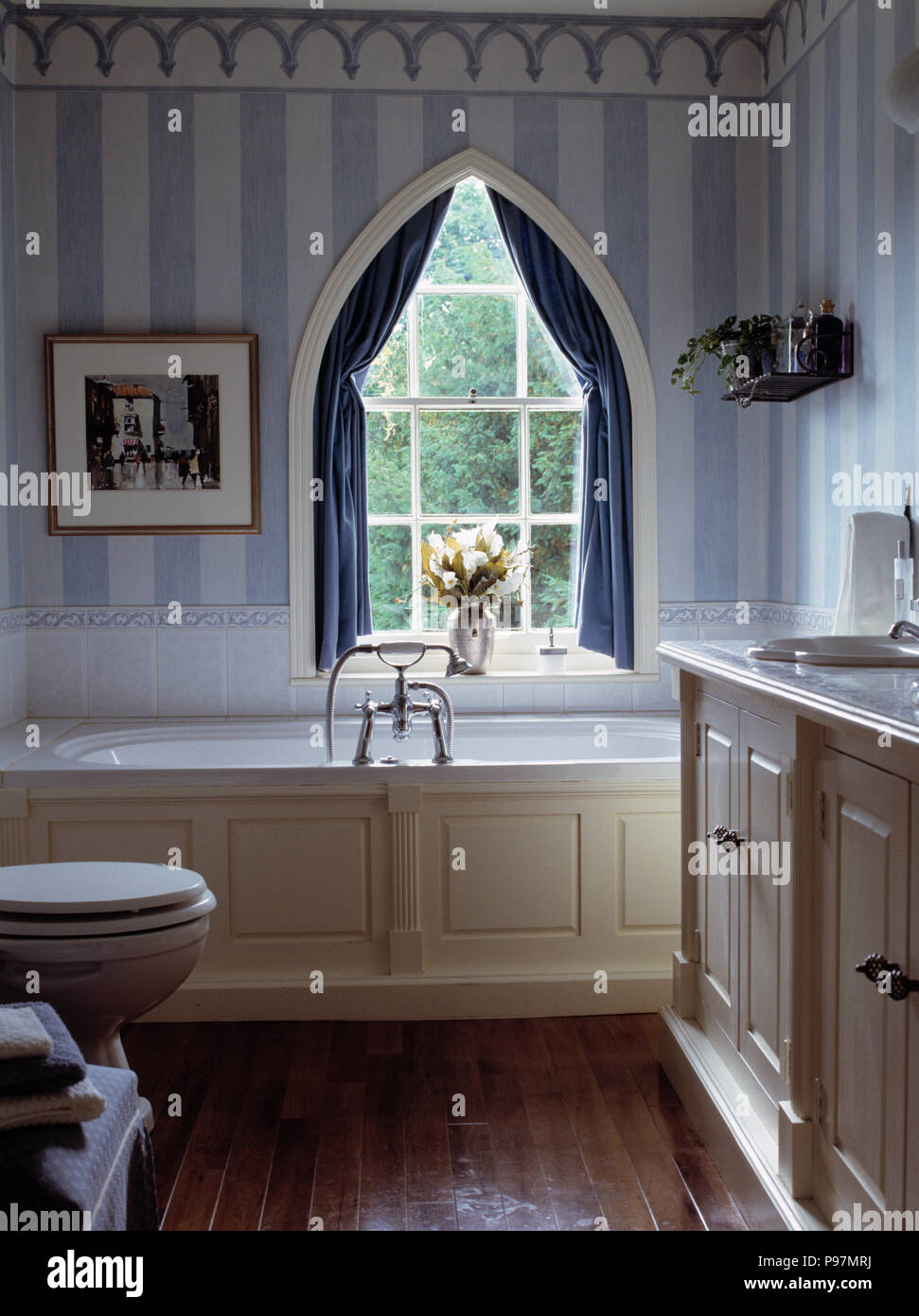 Bathroom with Striped Wallpaper and Border Stock Photo