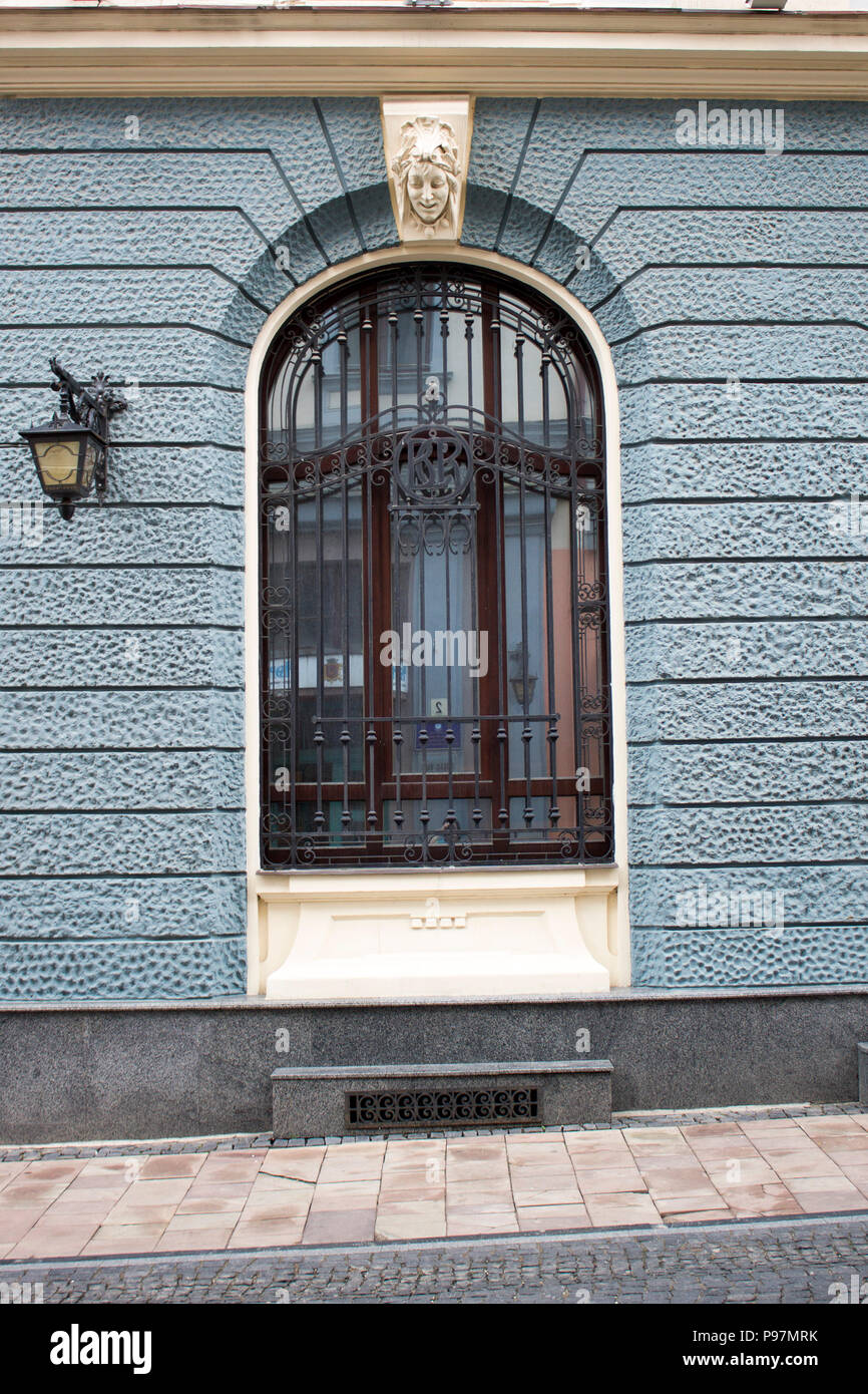 A window with a lattice of an ancient building Stock Photo