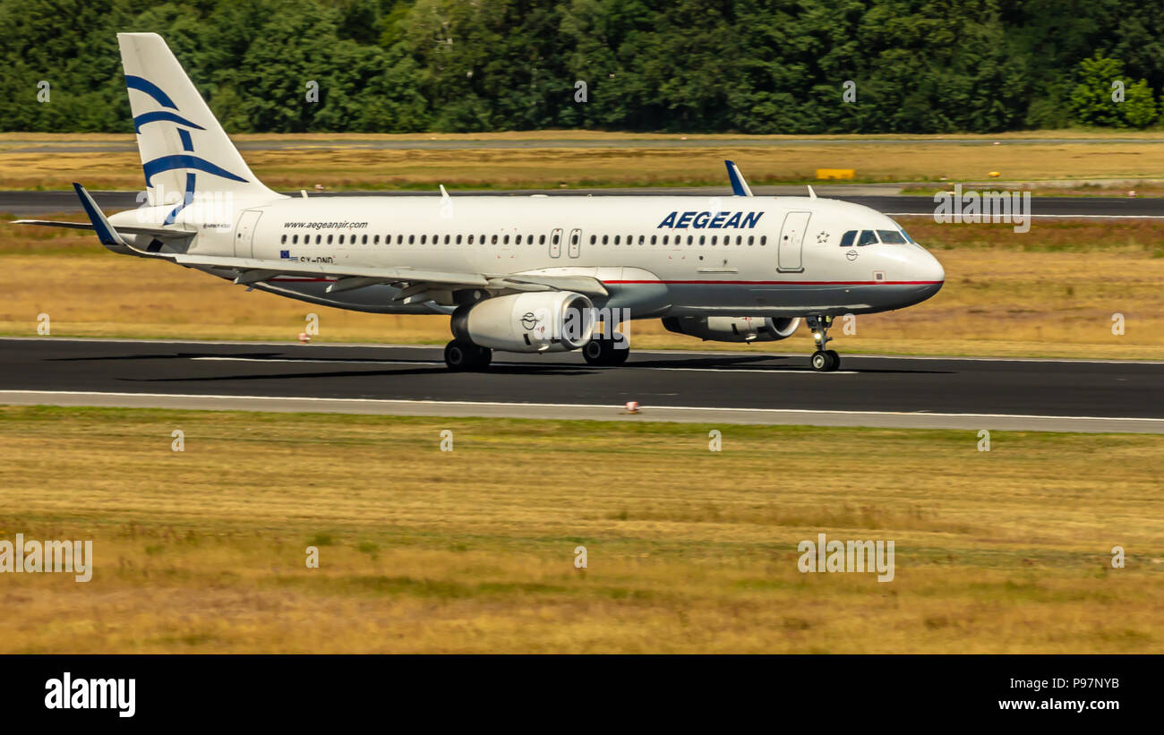 Berlin, Germany, 01.07.2018: Aegean Airlines Airbus A320 aircraft arriving at Tegel Airport Stock Photo