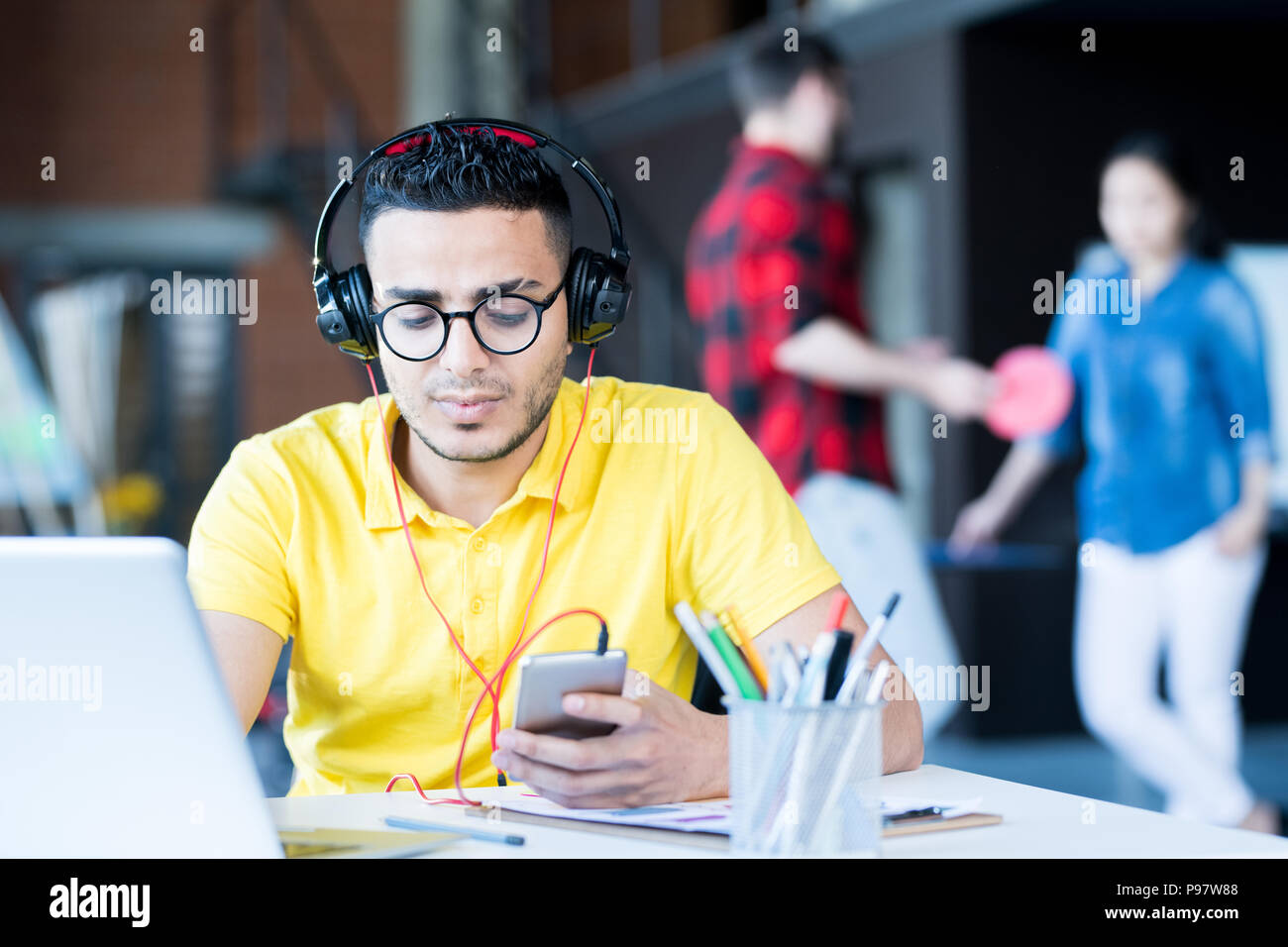 Contemporary Middle-Eastern Man Working in Office Stock Photo