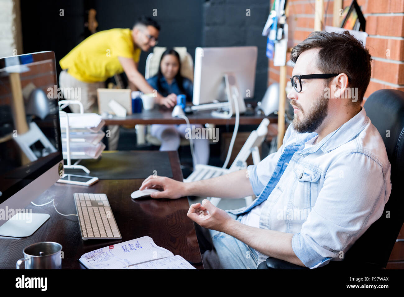 Contemporary Man Working in Office Stock Photo