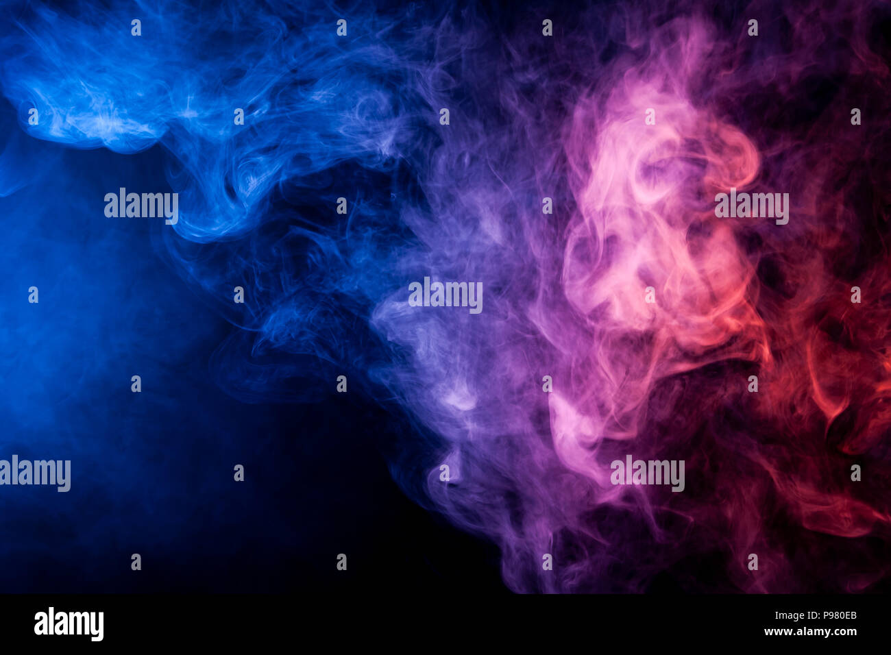 Blue and purple smoke on black background Stock Photo Alamy
