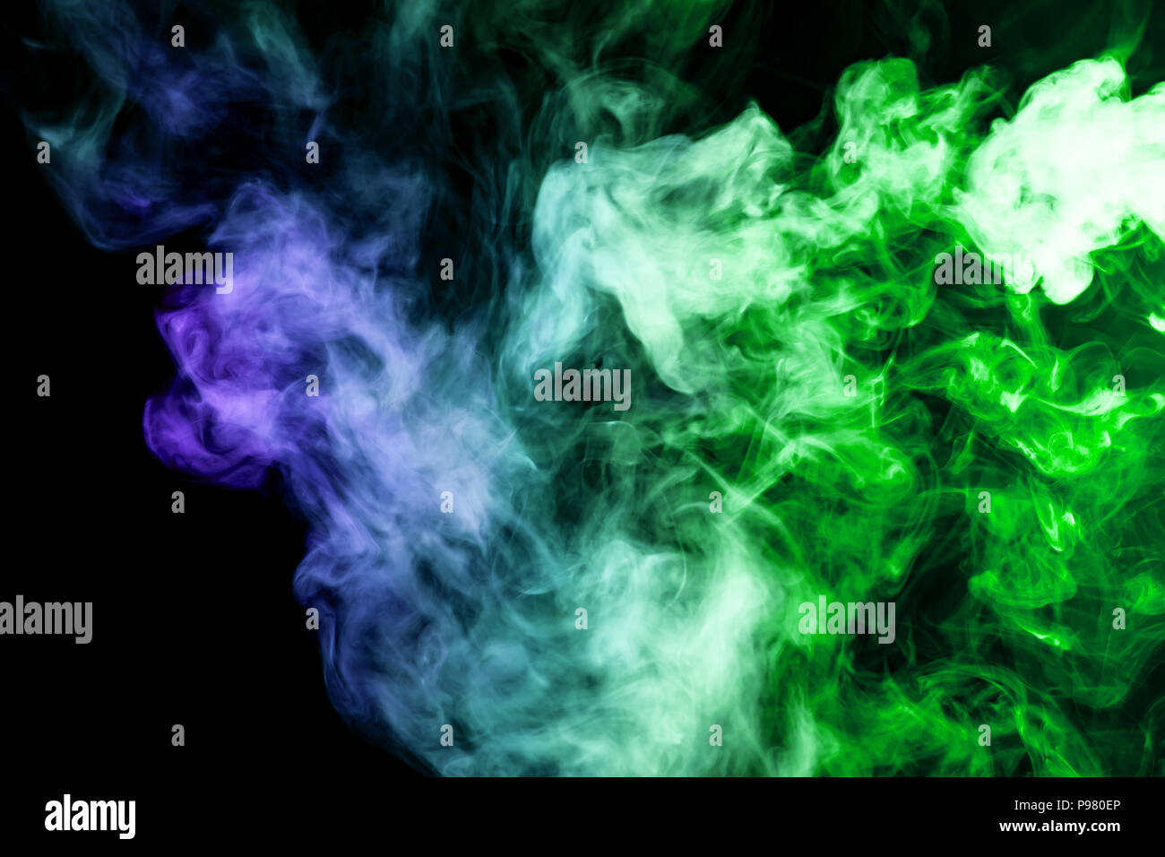 Green and blue smoke on black background Stock Photo - Alamy